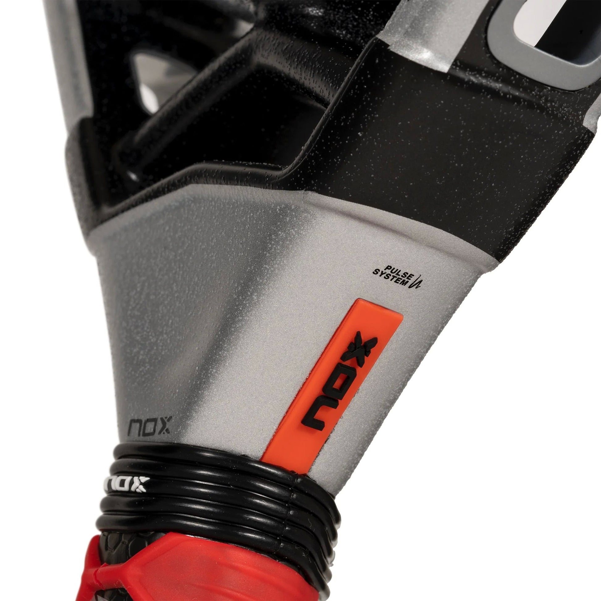 side up-close view of the pulse sytem of the Nox at10 genius 18k padel racket in white and black.